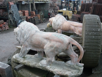 Pair of Granite Life-sized Walking Lions